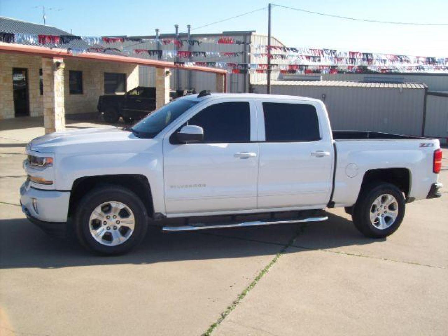 2017 White /Jet Black, leather Chevrolet Silverado 1500 LT Crew Cab 4WD (3GCUKRECXHG) with an 5.3L V8 OHV 16V engine, 6-Speed Automatic transmission, located at 605 West Oak Street, West, TX, 76691, (254) 826-5852, 31.803501, -97.098549 - Photo#0